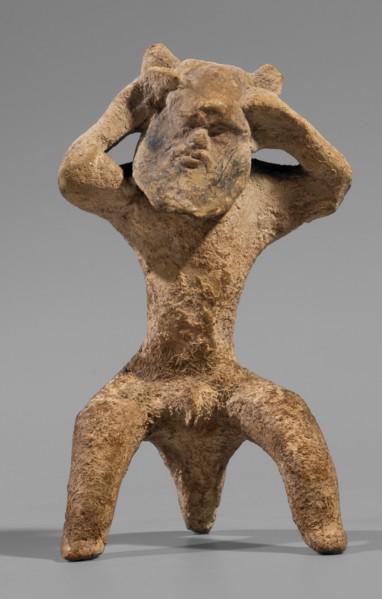 Satyr figurine. Clay figurine depicting a satyr with a face stylized as a mask with protruding ears