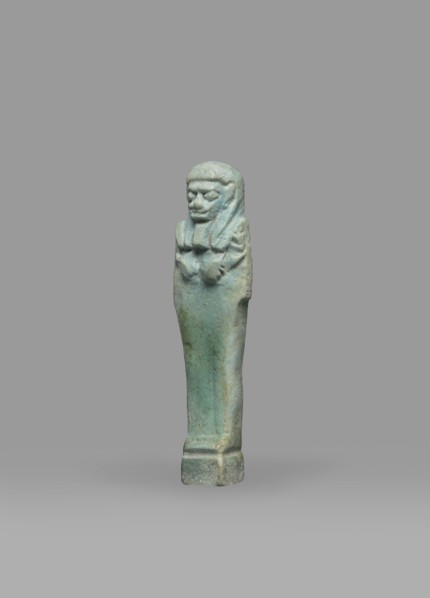 Ushabti, Mummy-shaped funerary figurine shabti, standing on a base, back supported by a