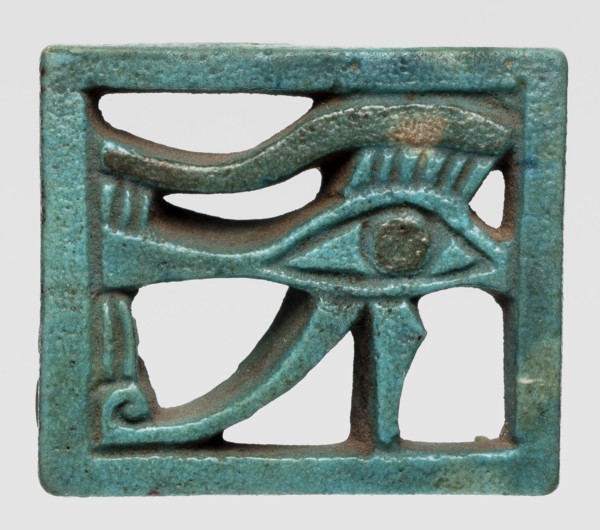 Amulet — Eye of Horus. Openwork Eye of Horus in a rectangular frame; iris and eyebrow black, the