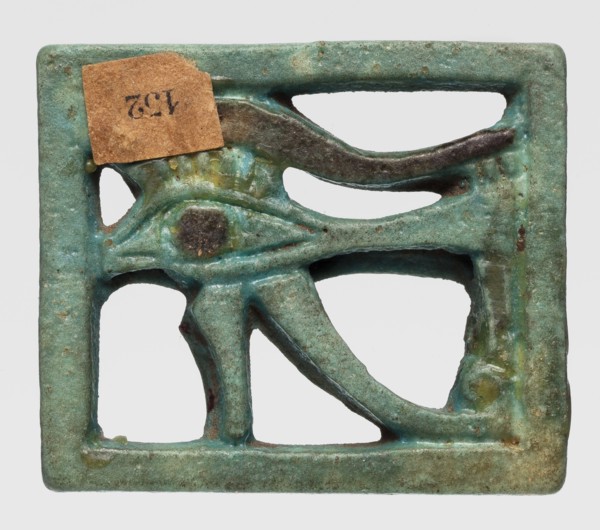 Amulet - Eye of Horus, Openwork Eye of Horus in a rectangular frame. Iris and eyebrow black, the