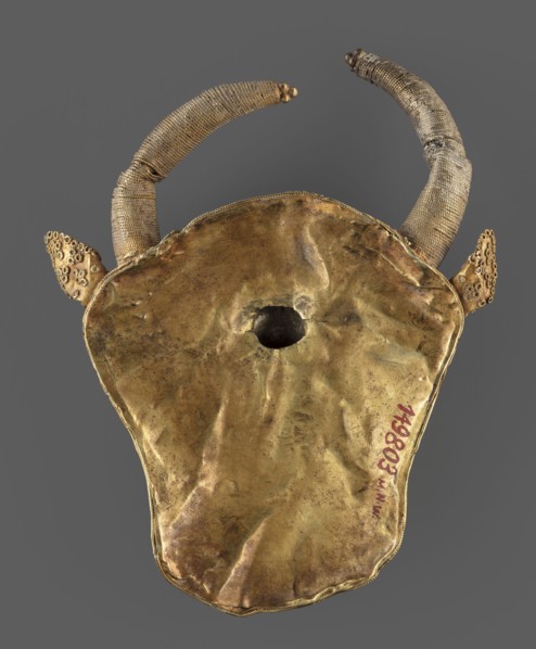 Protoma; bull's head relief mask in gold, made using repoussé with granulation and filigree.