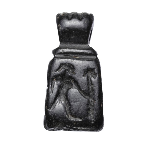 Stamp seal with figural representations. Glyptic stamp seal in the form of a truncated pyramid on a