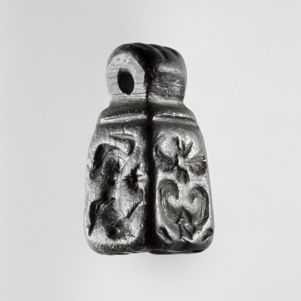 Stamp seal with figural representations. Glyptic, stamp seal in the form of a truncated pyramid on