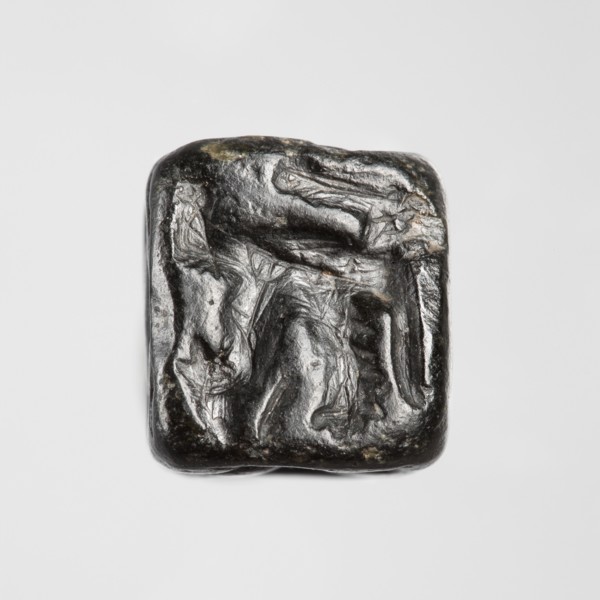 Stamp seal with figural representations. Glyptic stamp seal in the form of a truncated pyramid on a