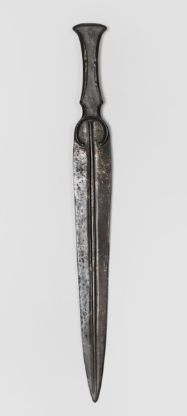 Dagger, unknown Luristan workshop. A dagger with a blade cast together with a mushroom-shaped hilt,
