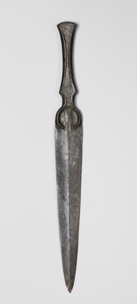 Dagger, unknown Luristan workshop. Short dagger with a blade cast together with a mushroom-shaped