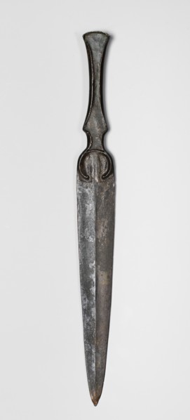 Dagger, unknown Luristan workshop. Short dagger with a blade cast together with a mushroom-shaped