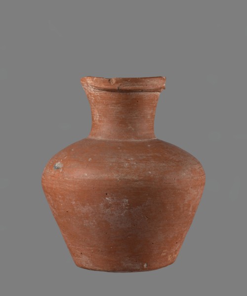 Jug with biconical belly, widest at mid-height; broad, gently sloping shoulders; wide neck slightly