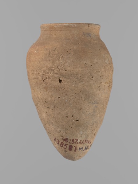Vessel with hieratic inscription. Conical clay vessel tapering toward a pointed bottom; irregular