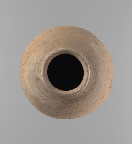 Vessel, Egyptian ceramic clay vessel of ovoid, slightly downward-stretched shape, widest at about