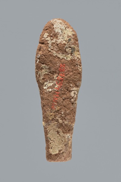 Ushabti. A mummy-shaped ushabti figurine made of clay, impressed in a mold. Traces of white primer