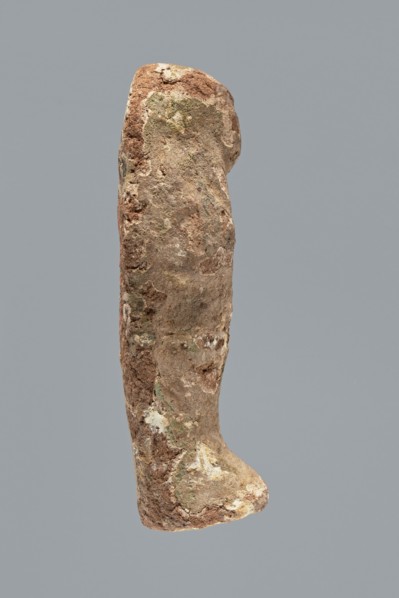 Ushabti. Mummy-shaped ushabti figurine made of clay, impressed in a mold. Traces of white primer