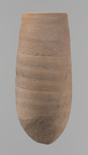 Vessel with a conical shape and a pointed bottom. Straight, tapering rim. Made on the wheel of Nile