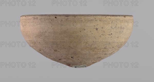Bowl, Bowl with a conical shape and a pointed bottom. Flat, straight rim. Vessel made on the wheel