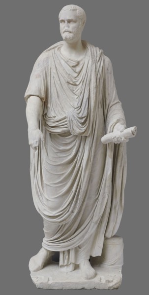 Roman statue, unknown Roman workshop. The figure of a standing man dressed in a tunic and toga,