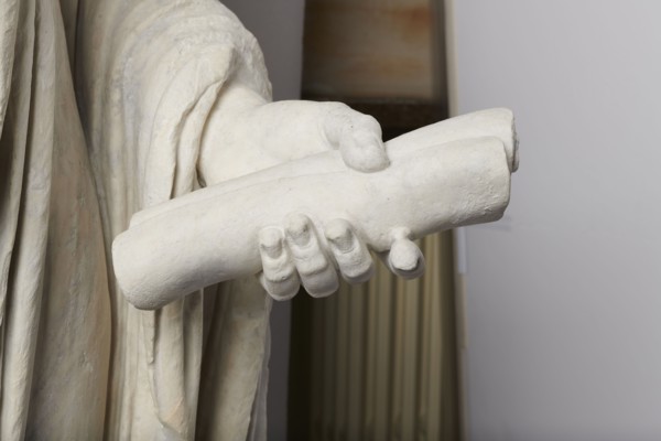 Roman statue, unknown Roman workshop. The figure of a standing man dressed in a tunic and toga,