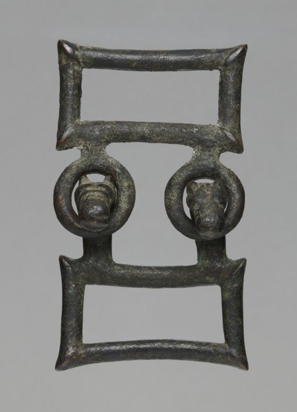 Buckle, bronze; two-part rectangular form with joints; one part with hooks shaped as zoomorphic