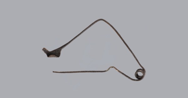 Fibula, Bronze Etruscan fibula with a bent ring made of flatly beaten wire, passing in a three-turn