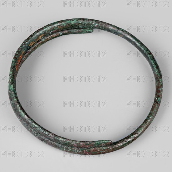 Bracelet. Made of flattened wire with thinning, overlapping ends. 9th–8th century BC; Villanovian