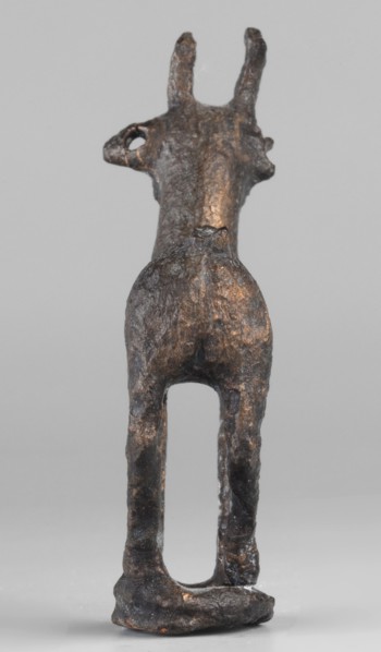 Emblem in the form of a figurine of a standing goat or gazelle, unknown Luristan workshop. Figurine