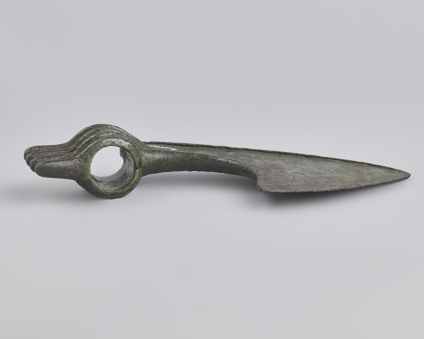 Battle axe, unknown Luristan workshop. Battle axe with a low cylindrical socket with a round hole,