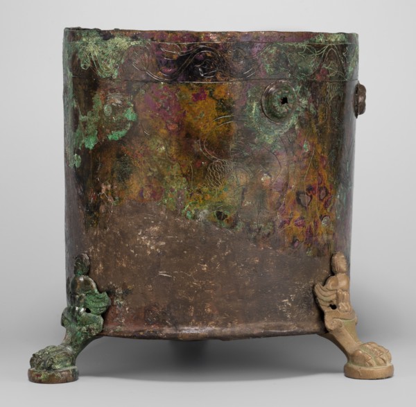 Cista container decorated with a depiction of the Dioscuri and Athena. Cylindrical vessel made of