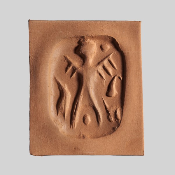 Stamp seal. Rectangular stamp seal with a handle in the form of a protruding ridge along the axis