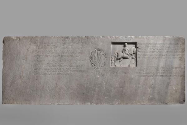 Family tombstone with epitaph, unknown workshop, Greek inscriptions, restitution Braniewo ; Lyc