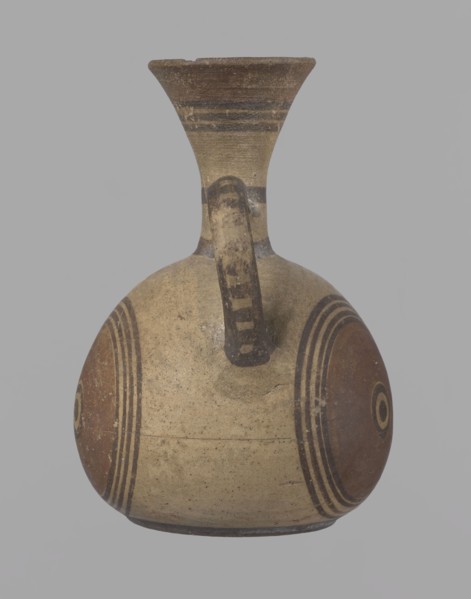 Cypriot jug, Jug on a low, straight foot. Globular body, flattened at the bottom. Quite narrow