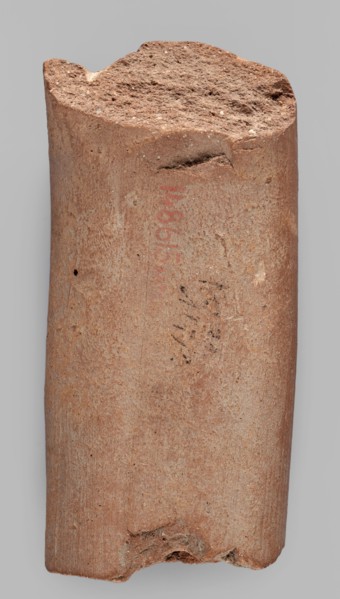 Fragment of a transport amphora vice with a stamp depicting an oinochoe and an incomplete Greek