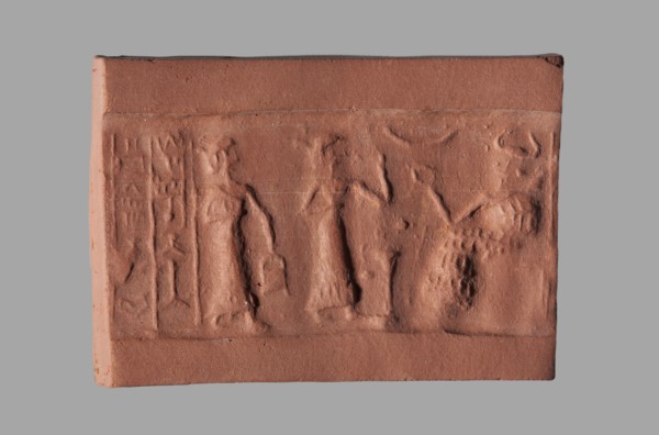 Cylinder seal with a presentation scene and a cuneiform inscription, unknown Akkadian workshop;