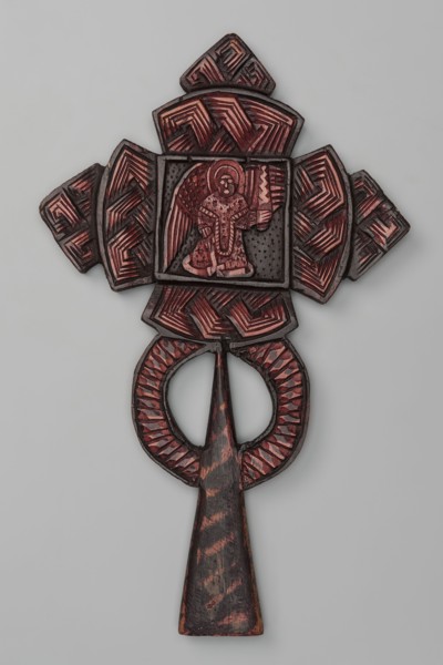 Processional cross, Ethiopian workshop. At the intersection of the cross's arms is a square