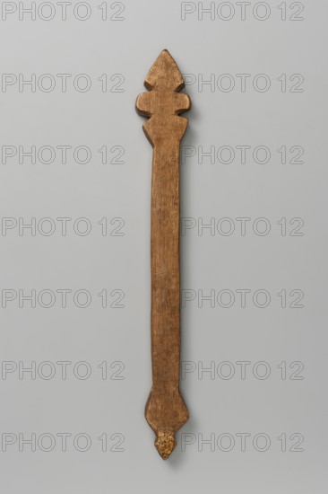 Hand cross, Ethiopian workshop. A small, roughly detailed hand cross with a rhomboid ending—shaped
