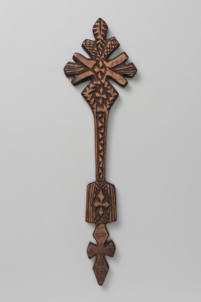 Hand cross, Ethiopian workshop. Hand cross with the upper part inscribed in a rhombus mounted on a
