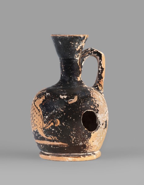 Lekythos with a sphinx, unknown Attic workshop. A small Attic red-figure lekythos with a spout. The