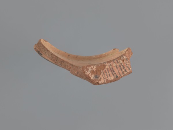 Fragment of a vessel stand, painted Coptic vessel stand with floral decorations. Walls formed into