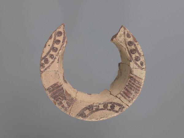 Fragment of a censer, upper part with a spout. The inner and outer surfaces are covered with a
