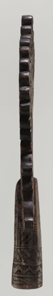 Processional cross, Ethiopian workshop. Pear-shaped frame depicts Christ on the cross with John and