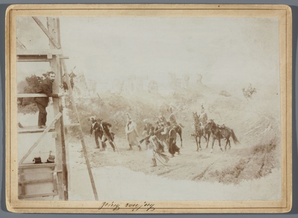 Painting the Raclawice Panorama: Teodor Axentowicz standing on scaffolding by a part of the canvas