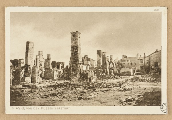View of buildings destroyed by the Russians; postcard showing chimneys and war damage in a city