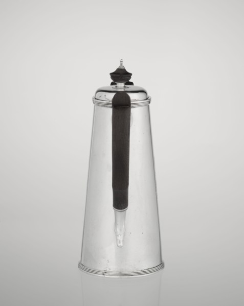 Conical coffee pot with hinged lid, slightly arched and flattened at the top, topped with a wooden
