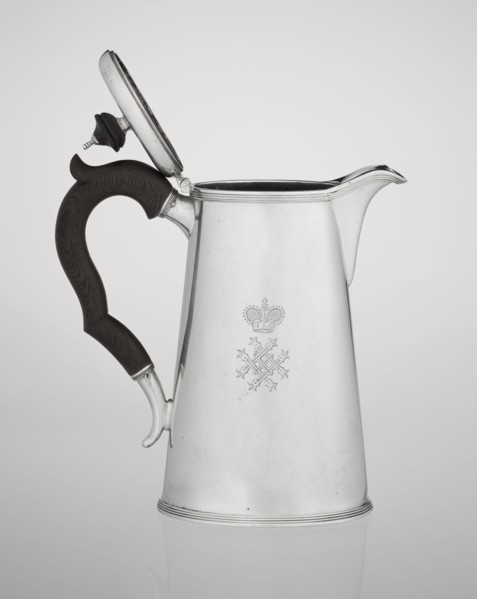 Conical coffee pot with hinged lid, slightly arched and flattened at the top, topped with a wooden