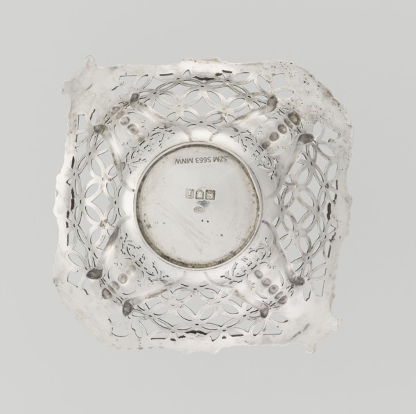 Openwork basket by Comyns & Sons London; goldsmiths' firm; fl. 1859–1953. Four-sided openwork