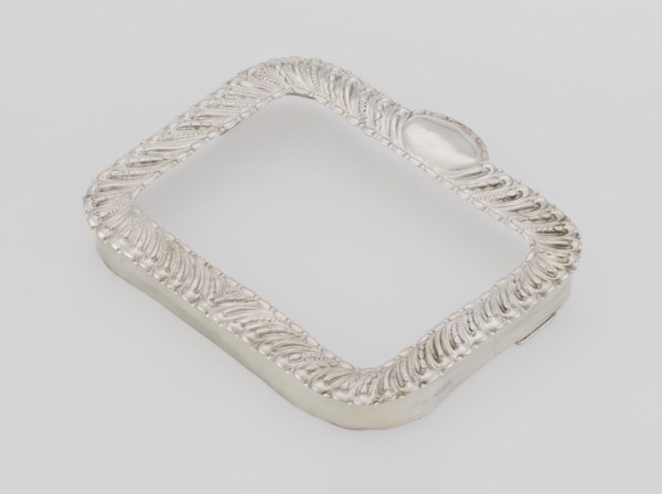Dressing mirror frame; maker: Comyns & Sons London; goldsmiths; fl. 1859–1953; corporate slogans;