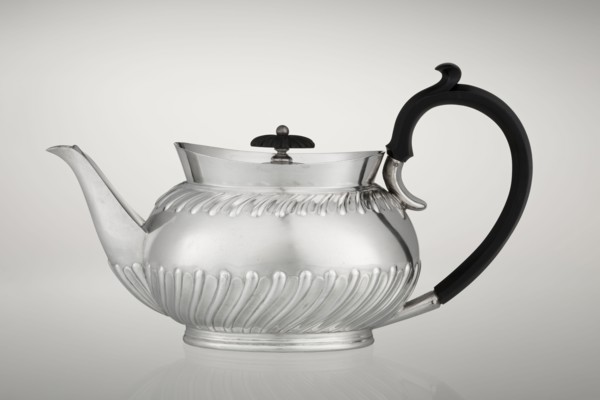 Teapot by Goldsmiths & Silversmiths Co Ltd London; makers William Gibson & John Langman goldsmiths.