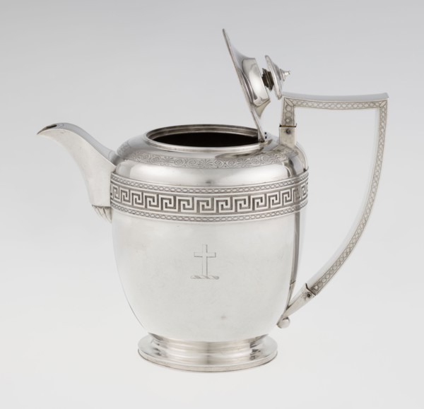 Teapot by John Emes fl. 1796–1808, goldsmith. Ovoid teapot on a circular base with lid, decorated