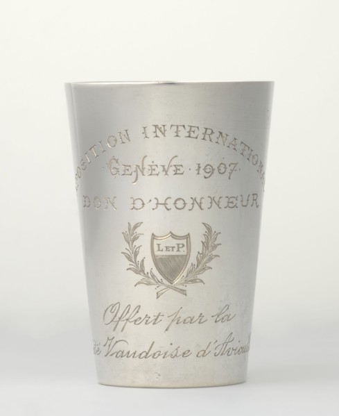 Art Nouveau conical mug by Jezler & Co. Schaffhausen; silversmith; est. 1822. Relief ornament of