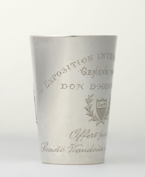 Art Nouveau conical mug by Jezler & Co Schaffhausen; silversmith; est. 1822. Relief ornament of