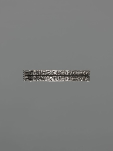 Bracelet; maker, scrap metal; Chinese/Mongolian decorative style; dragons including dragon with
