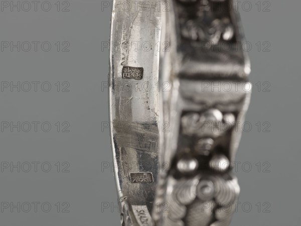 Bracelet, scrap metal, purchased; Chinese and Mongolian art influences; body/hand ornament, fashion